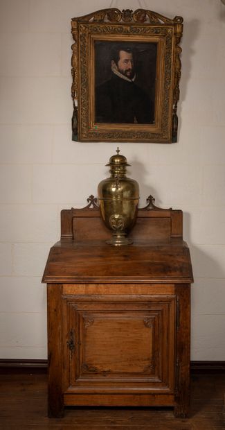 
Small writing desk in natural wood opening...