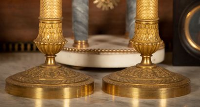 
Pair of ormolu torches with chased fish...