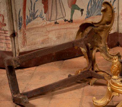 
Pair of ormolu andirons of rocaille form.




Louis...