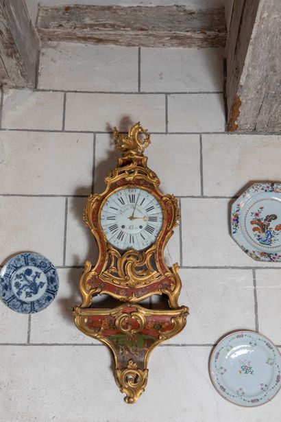 
Carved and red lacquered wood cartel and...