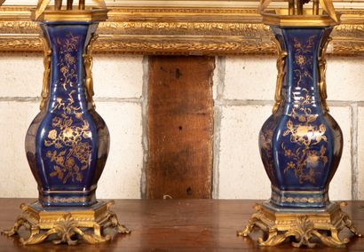 
Pair of hexagonal candelabra vases in blue-glazed...