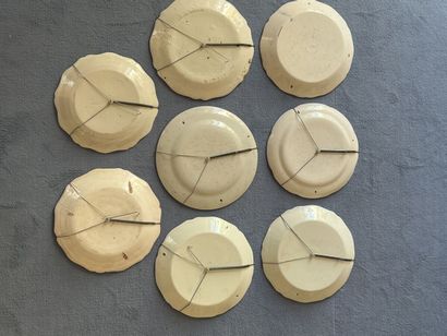Huit assiettes en faience de Nevers à divers...