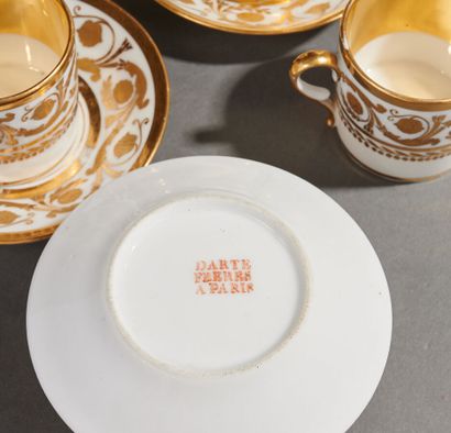 
DARTE - Service en porcelaine à décor doré...