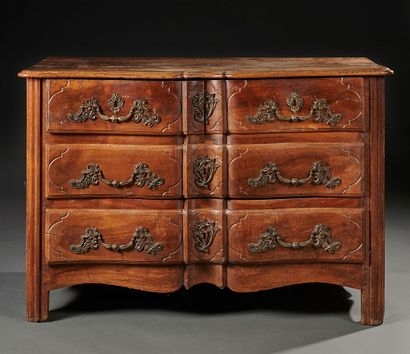 
Commode en bois naturel ouvrant à quatre...