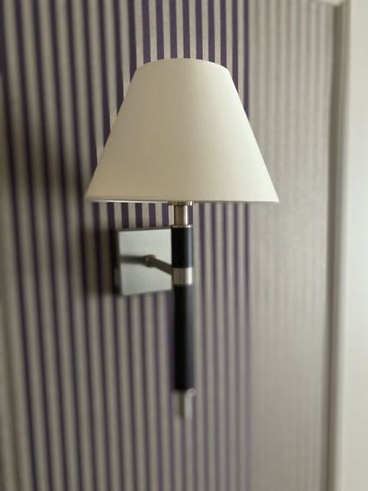 Three sconces in dark tinted wood and metal...