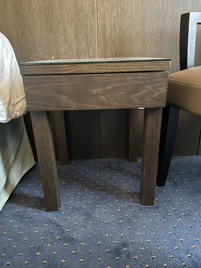 Two dark wood bedsides with a drawer and...
