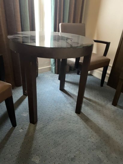Round wooden table, black tinted mirror surface...