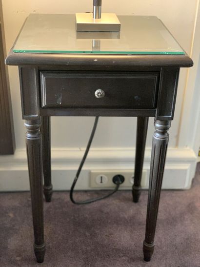 Pair of bedside tables in dark stained wood...