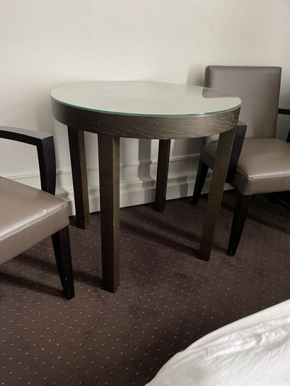Round wooden table, black tinted mirror surface...