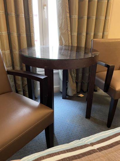 Round wooden table, black tinted mirror surface...