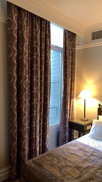 Pair of lined curtains decorated with mauve...