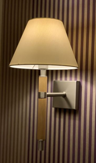 Three sconces in natural wood and metal (one...