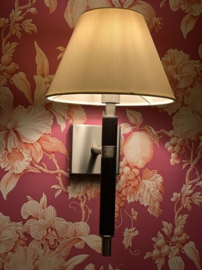 Three sconces in dark tinted wood and metal...