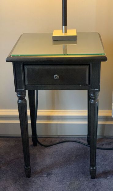 Pair of bedside tables in dark stained wood...