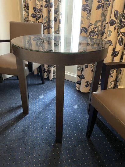 Round wooden table, black tinted mirror surface...