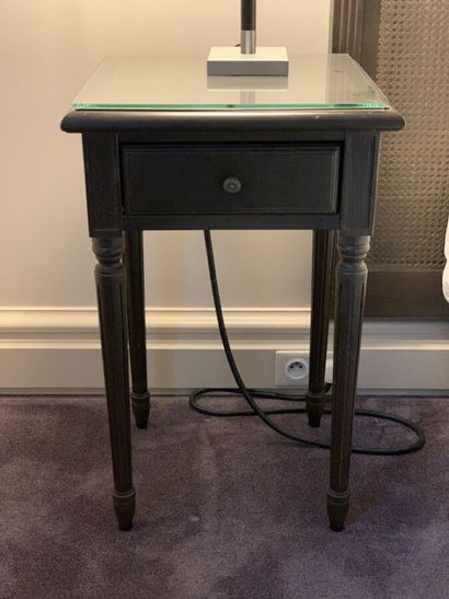Pair of bedside tables in dark stained wood...