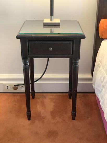 Pair of bedside tables in dark stained wood...