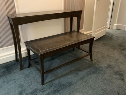 A rectangular coffee table and console in...