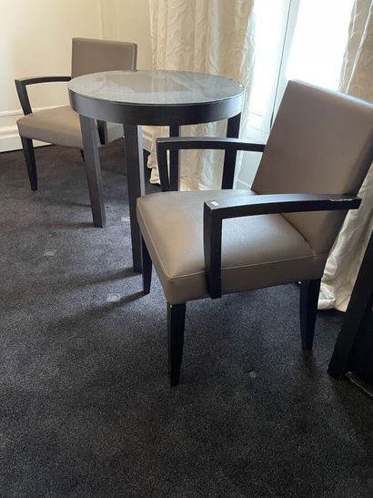 Two wooden armchairs upholstered in taupe...