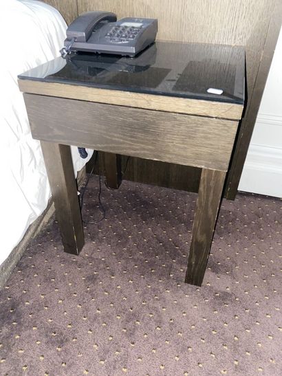 Two dark wood bedsides with a drawer and...
