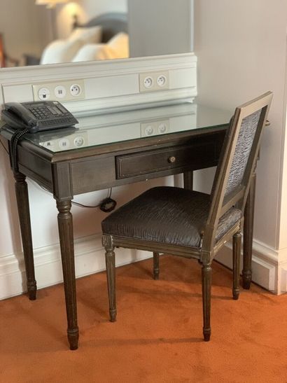 Small desk in dark stained wood and molded...