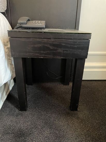 Two dark wood bedsides with a drawer and...