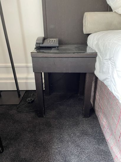 Two dark wood bedsides with a drawer and...