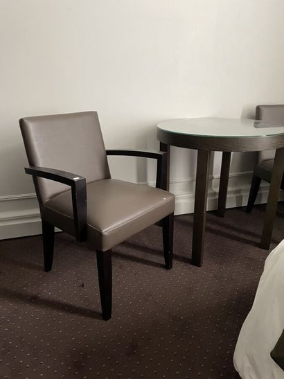 Two wooden armchairs upholstered in taupe...