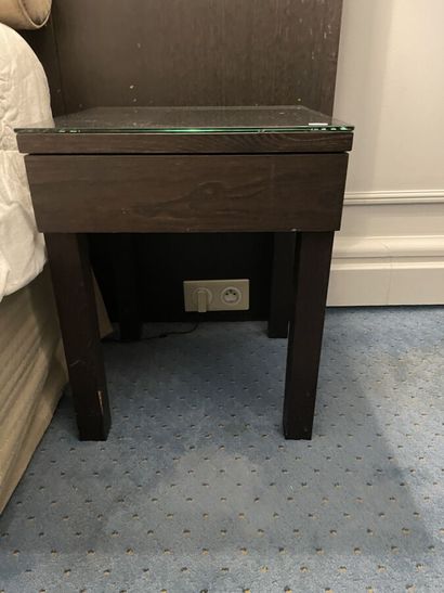 Two dark wood bedsides with a drawer and...