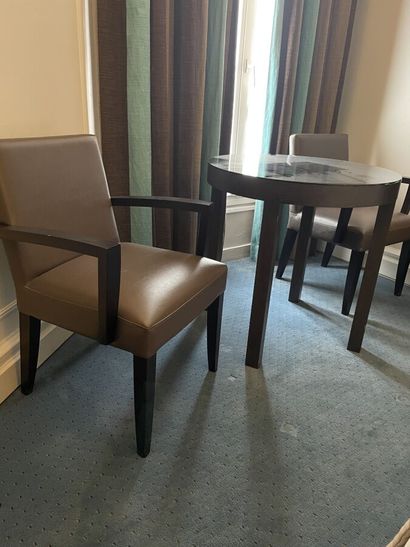 Two wooden armchairs upholstered in taupe...