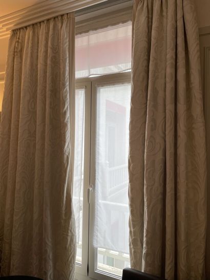 Pair of ivory curtains with stylized vegetal...