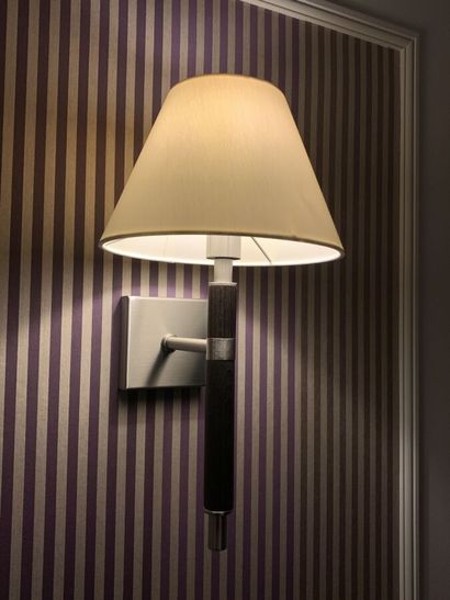 Three sconces in dark tinted wood and metal...