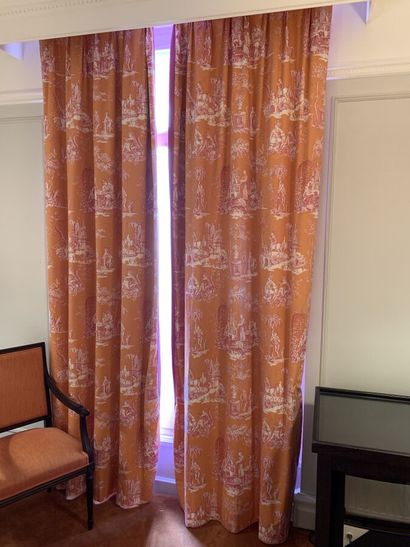 Pair of curtains lined with patterns of toile...