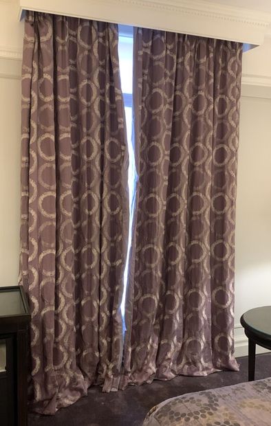 Pair of lined curtains decorated with mauve...