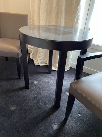 Round wooden table, black tinted mirror surface...