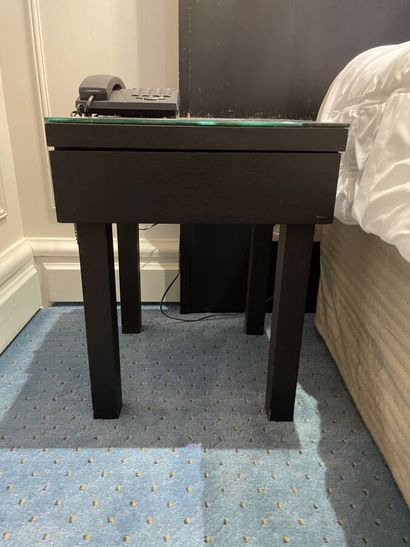Two dark wood bedsides with a drawer and...