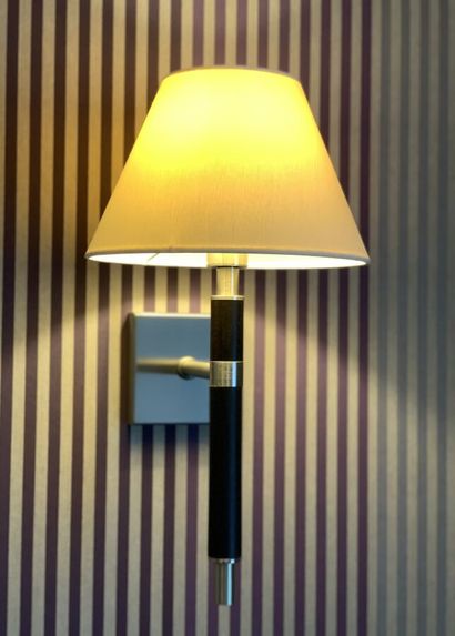 Two sconces in dark tinted wood and metal...