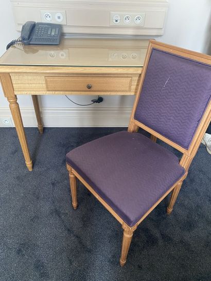 Small desk in natural wood opening on a drawer,...