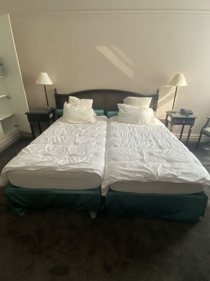 Double bed composed of two box springs and...