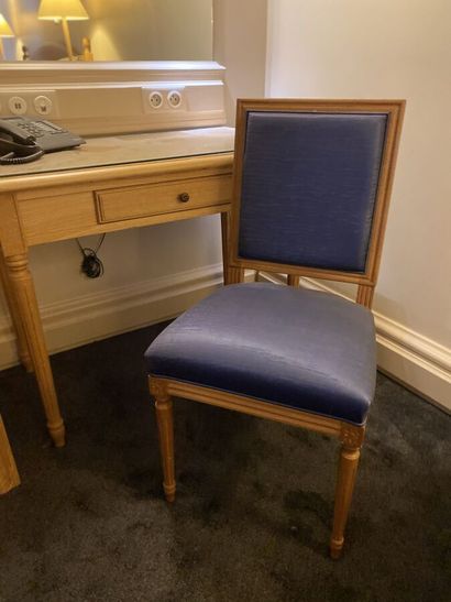 Small desk in natural wood opening on a drawer,...