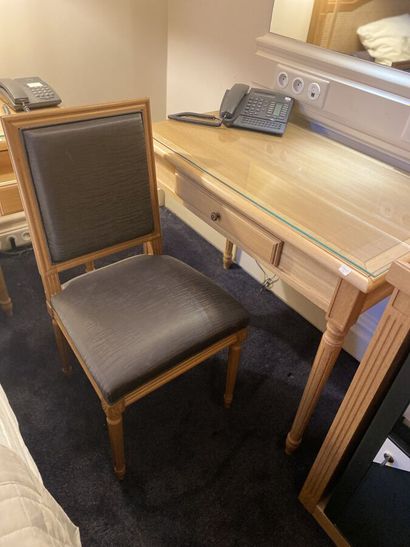 Small desk in natural wood opening on a drawer,...