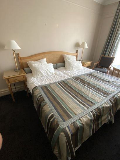 Double bed composed of two box springs and...