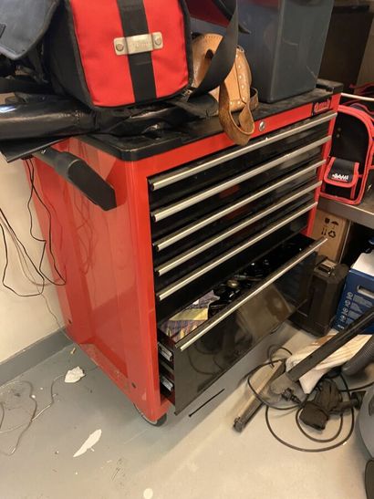 Metal workshop trolley on wheels and its...