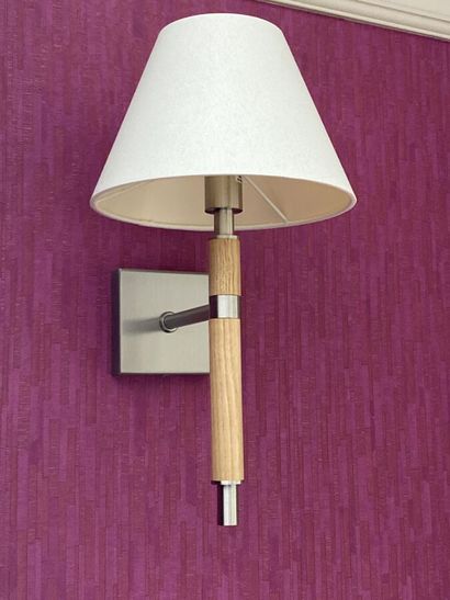 Suite of three sconces in chromed metal and...