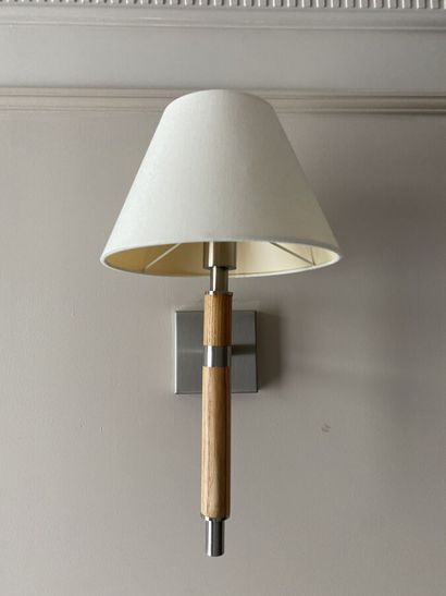 Suite of three sconces in chromed metal and...