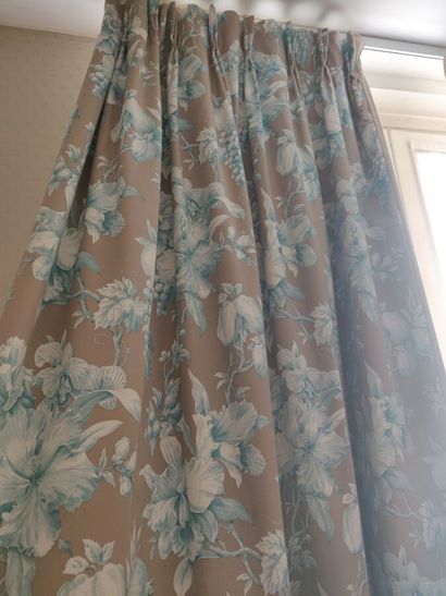 Pair of curtains with plant decoration on...