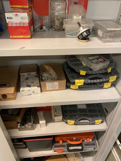 4 metal cabinets and their contents of hardware...