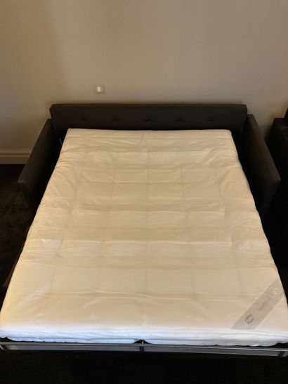 Large two-seater sofa with dark brown skai...