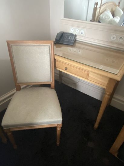 Small desk in natural wood opening on a drawer,...