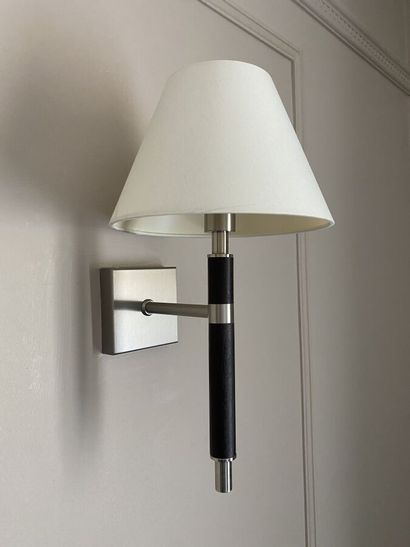 Suite of three sconces in chromed metal and...